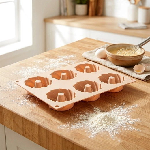 6 vdolbin z osrednjim stožcem za enakomerno peko