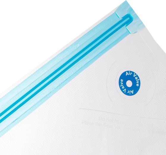 Dvojna zadrga in ventil za popoln vakuum