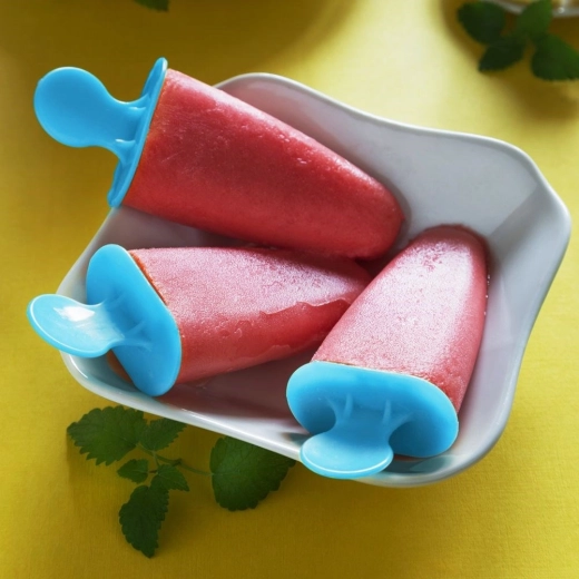 Ergonomsko držalo z lovilnikom kapljic