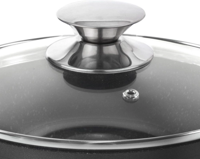 Stekleni pokrov z ventilom za paro