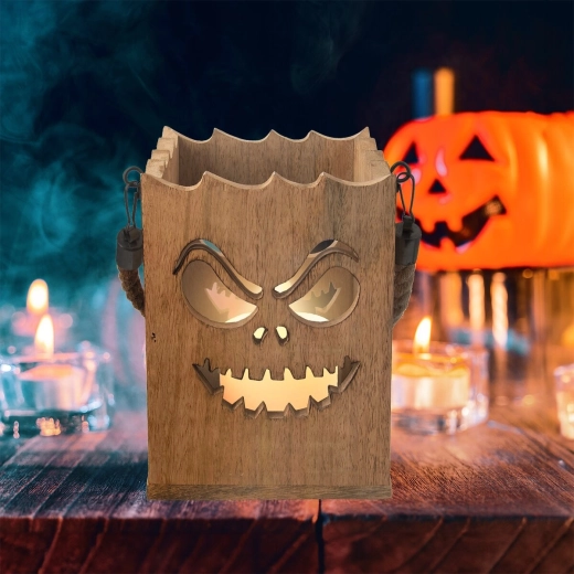 Halloweenski svetlobni učinek zaradi izrezljanega motiva