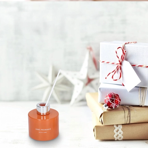 Eleganten difuzor v oranžnem steklu