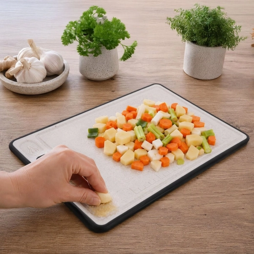 Practical surface with a garlic-grating corner