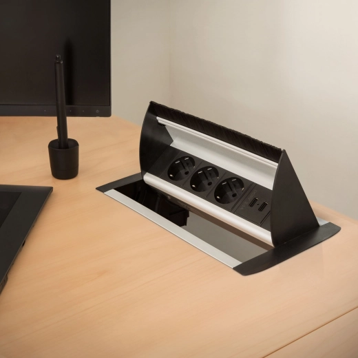 Built-in pop-up power strip with USB