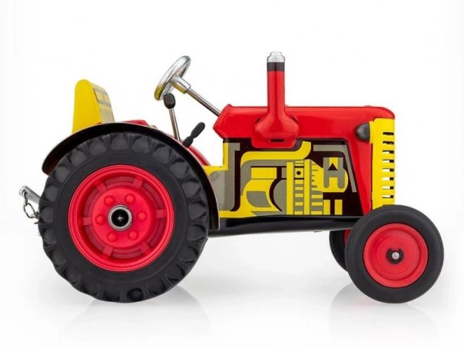 Traktor Zetor rdeč na ključ kovina 14cm 1:25 v škatli Kovap