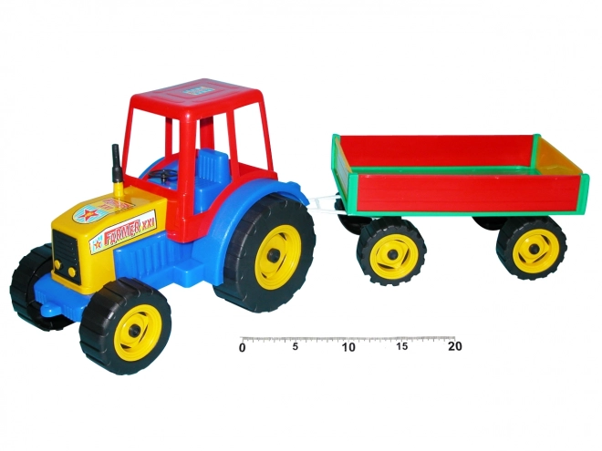 Traktor pisanih barv s prikolico 45 cm