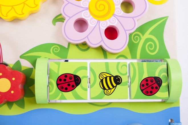 Bigjigs Baby Lesena motorična plošča s cvetovi