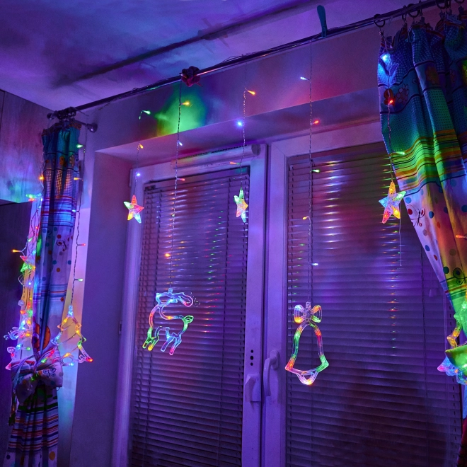 LED barvni zaves z božičnimi motivi - 2,5 m, 138 LED