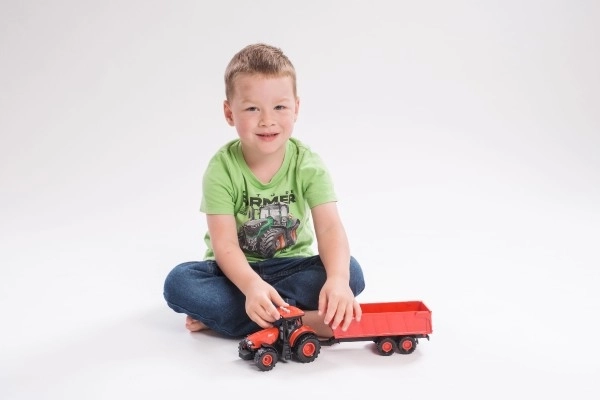 Rdeč traktor Zetor s prikolico z zvočnimi in svetlobnimi učinki - 36 cm