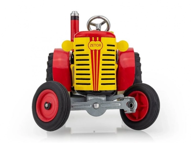 Traktor Zetor rdeč na ključ kovina 14cm 1:25 v škatli Kovap