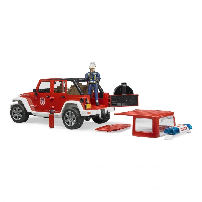Bruder Rdeči gasilski JEEP WRANGLER s figurico in dodatki