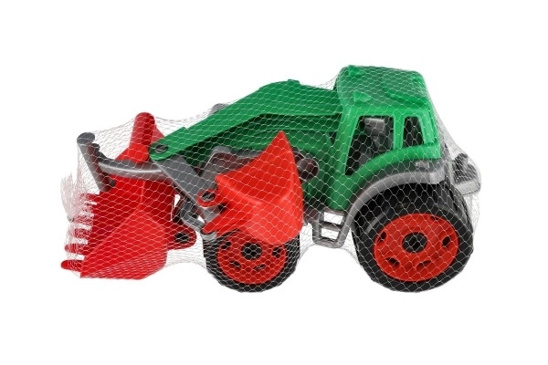 Traktor z žlico in bagrom
