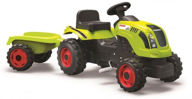 Pedalni traktor CLAAS Arion 400 z zelenim prikolidcem