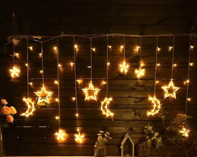 LED topel bela zavesa s zvezdicami in lunami - 2,5 m, 138 LED