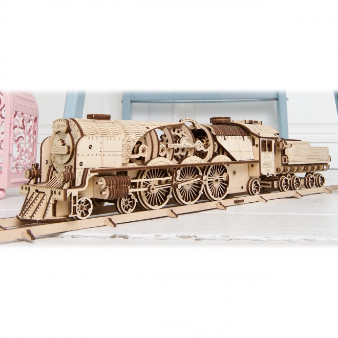 Ugears 3D sestavljanka - Lokomotiva V-express z vagonom 538 kosov
