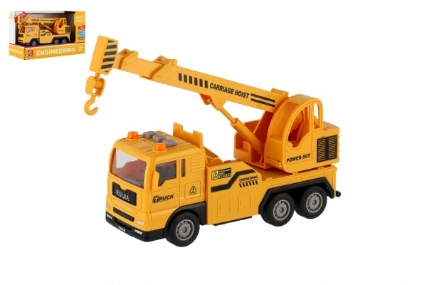 Plastični avto žerjav 16cm na vztrajnik na baterije z lučjo in zvokom v škatli 21x13x9cm