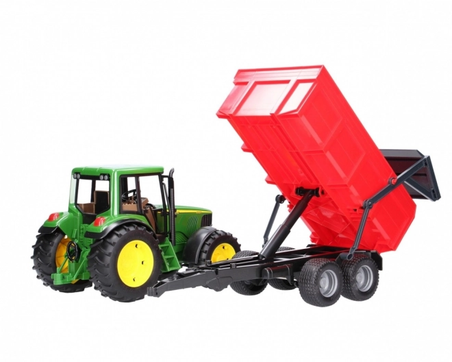 Bruder Traktor John Deere in prekucni priklopnik