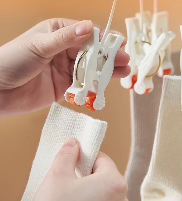 Plastični zložljivi obešalnik za oblačila s klipi - 19 klipov - beli