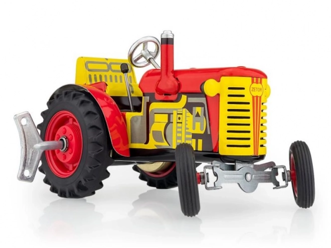 Traktor Zetor rdeč na ključ kovina 14cm 1:25 v škatli Kovap
