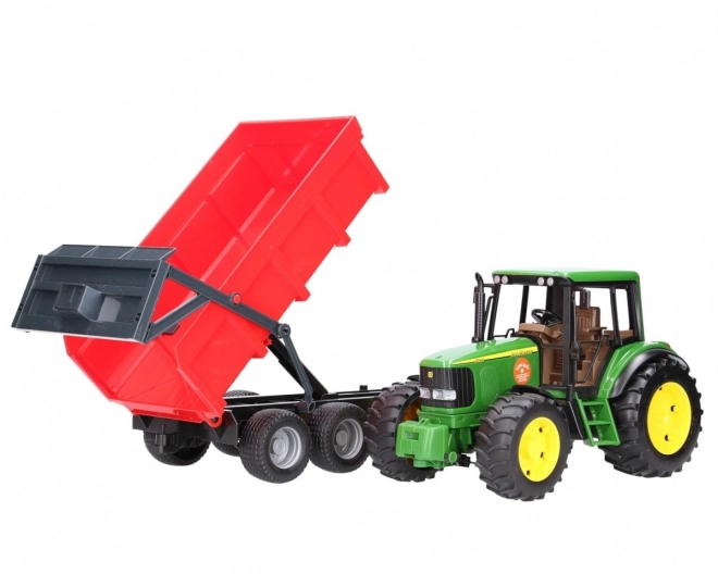 Bruder Traktor John Deere in prekucni priklopnik