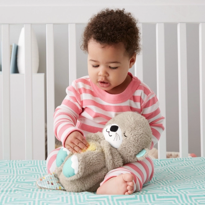 Fisher-Price Pomirjujoča vidra z melodijami FXC66