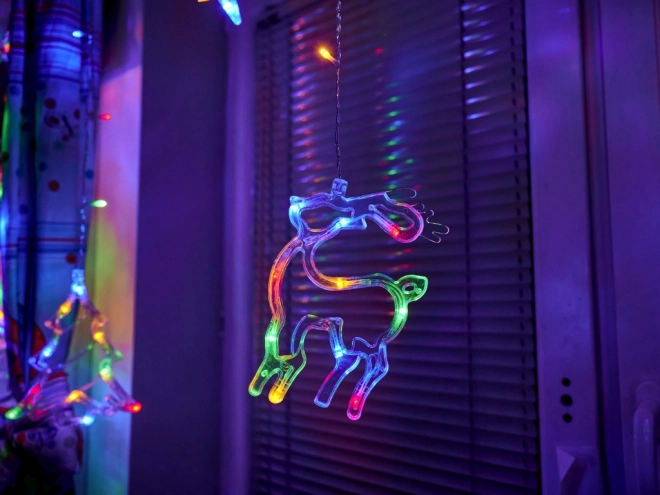 LED barvni zaves z božičnimi motivi - 2,5 m, 138 LED