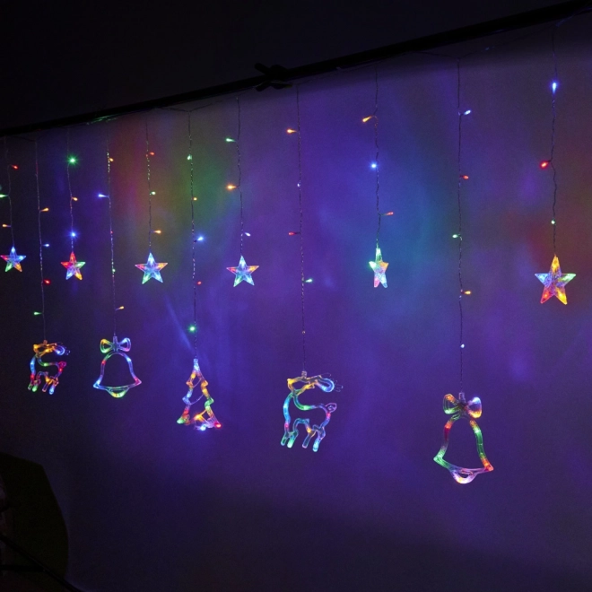 LED barvni zaves z božičnimi motivi - 2,5 m, 138 LED