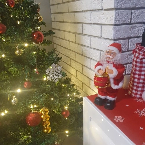 Igrajoča in pojoča figurica Božička 30 cm