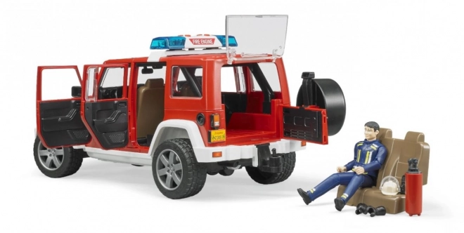 Bruder Rdeči gasilski JEEP WRANGLER s figurico in dodatki