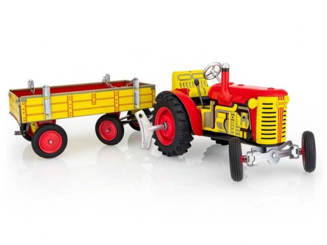 Traktor Zetor z navesom rdeč na ključek kovinski 28cm Kovap v škatli