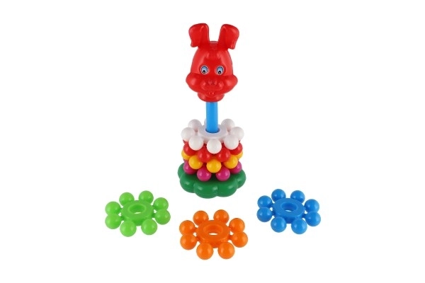 Stapljiva piramida s obroči plastika 26cm v mreži 12m+