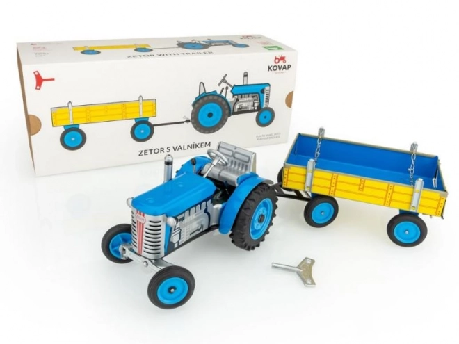 Traktor Zetor z navesom rdeč na ključek kovinski 28cm Kovap v škatli