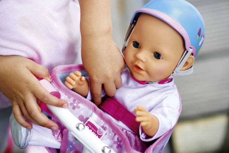 Varno pripenjanje punčke