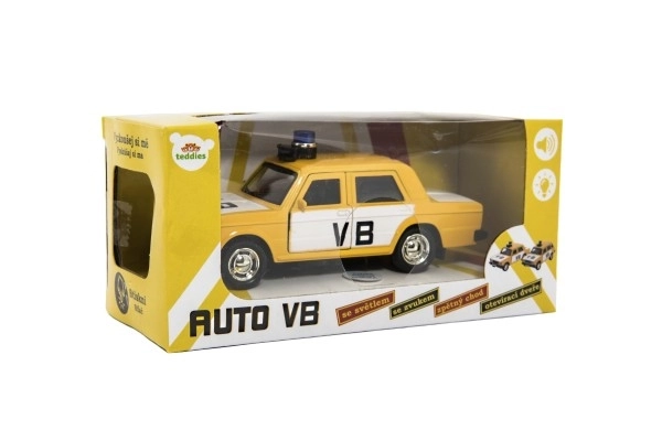 Policijski avto VB kovina/plastika 12cm na povratno vzmet na baterije s svetlobo, zvokom v škatli 15x7x7cm