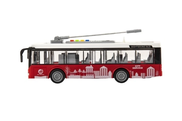 Avtobus/trolejbus plast 28cm na vztrajnik na bat. s svetlobo z zvokom v škatli 32x17x11cm