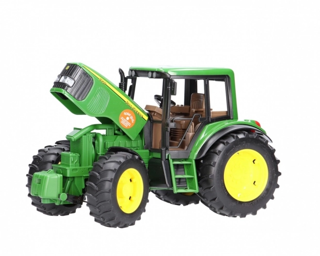 Bruder Traktor John Deere in prekucni priklopnik