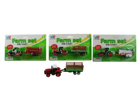 Kovinski traktor s prikolico