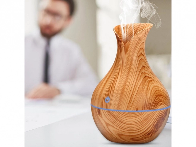 Aroma difuzor s svetlobnimi učinki
