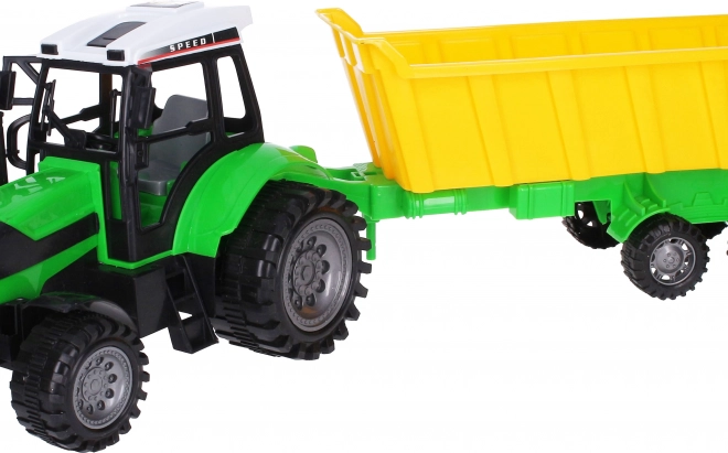 Velik traktor s prikolico