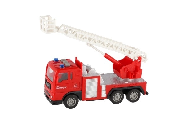 Avto gasilci plastika 16cm na vztrajnik na baterije z lučjo in zvokom v škatli 21x13x9cm