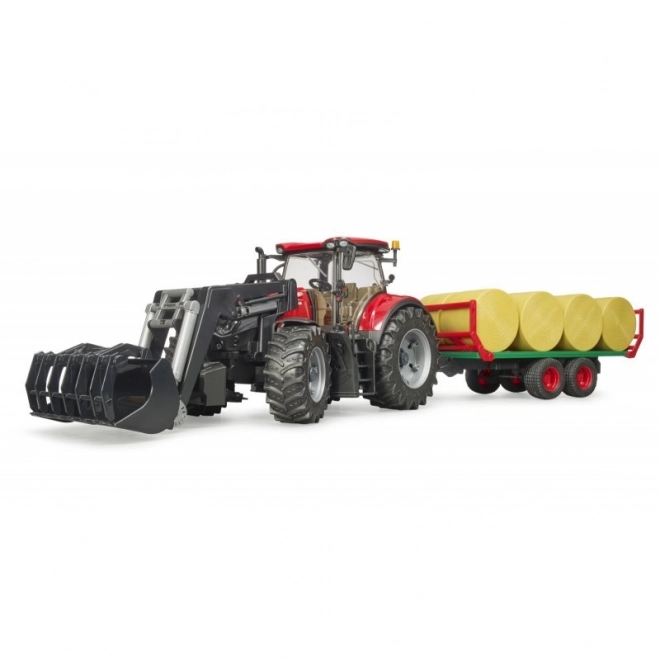 Bruder Traktor Case IH Optum 300 CVX s čelnim nakladalcem in prevoznikom za bale