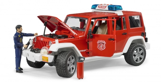 Bruder Rdeči gasilski JEEP WRANGLER s figurico in dodatki