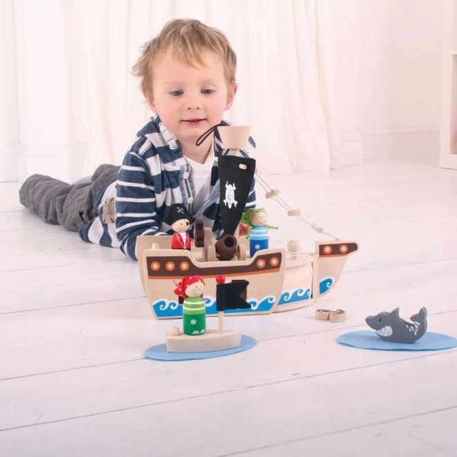 Lesena piratska ladja s priborom od Bigjigs Toys