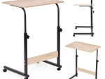 Mobile laptop side table next to armchair in light oak decor ModernHome