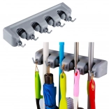 Stenski nosilec za orodje in ščetke s kavlji